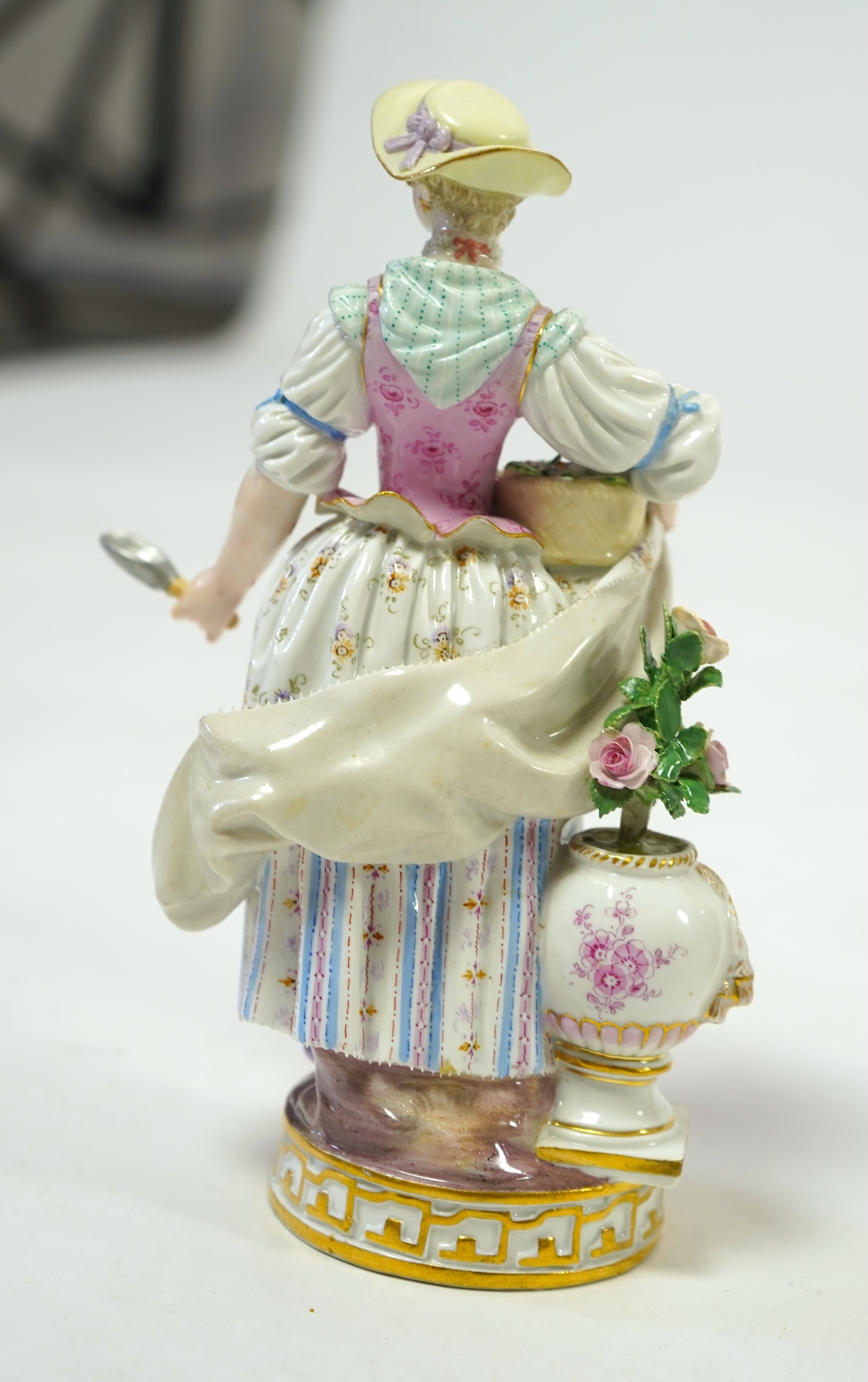 A pair of Meissen porcelain figures of gardeners, late 19th century